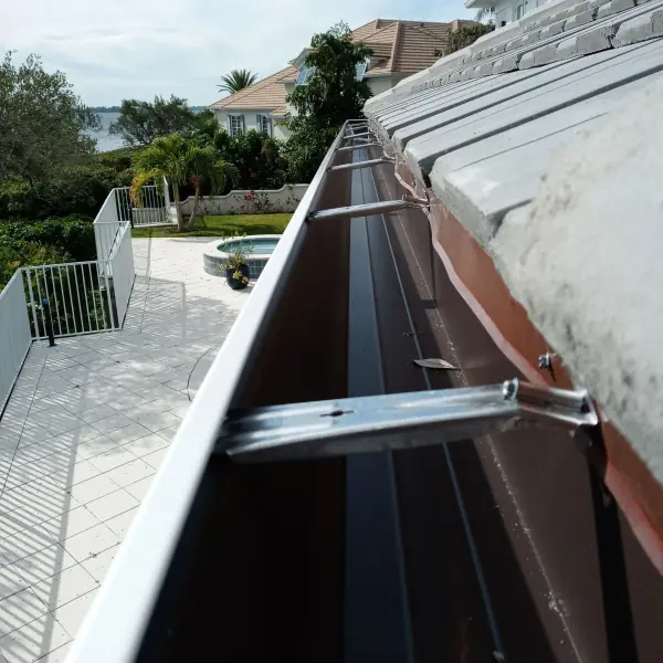 Inside view of a new seamless gutter with hidden hangers